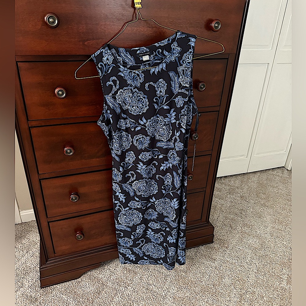 Tags still on! Knee length Tommy Hilfiger knee length dress. Stretchy material.